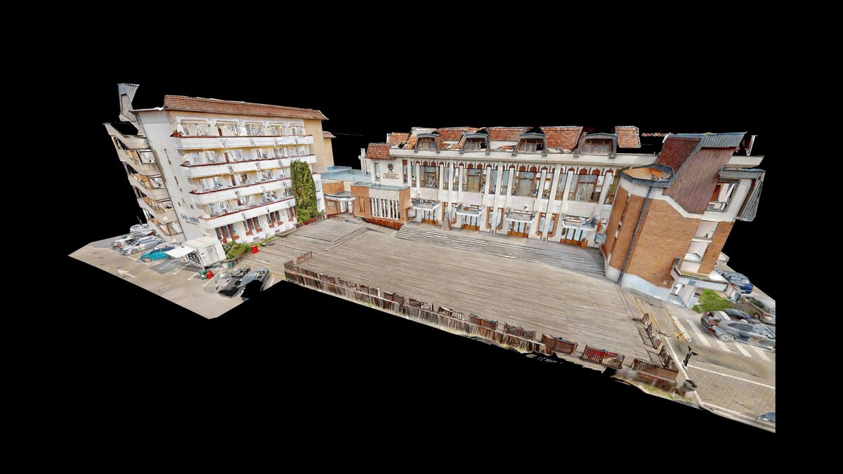 Modelul 3D scanat — nor de puncte al aceleiași clădiri